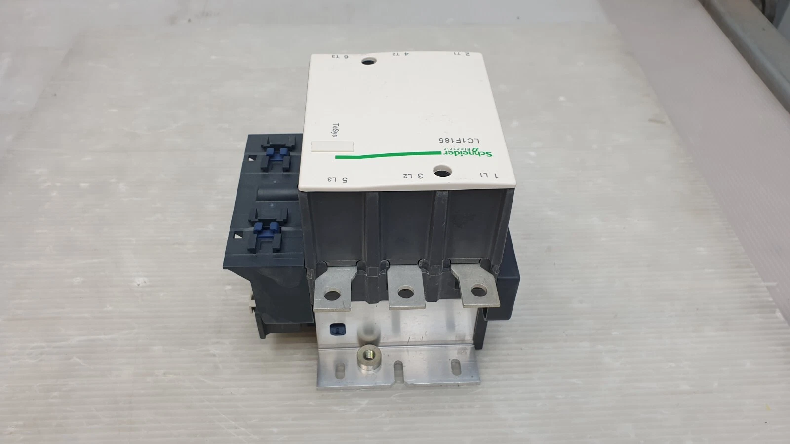 Schneider TeSys LC1F185 contactor with three load bars and mounting plate