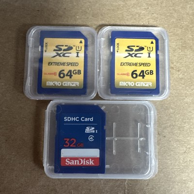2- SanDisk 64GB Ultra XC Memory Card, Speed Up to 120MB/s. 1- 32 Gb