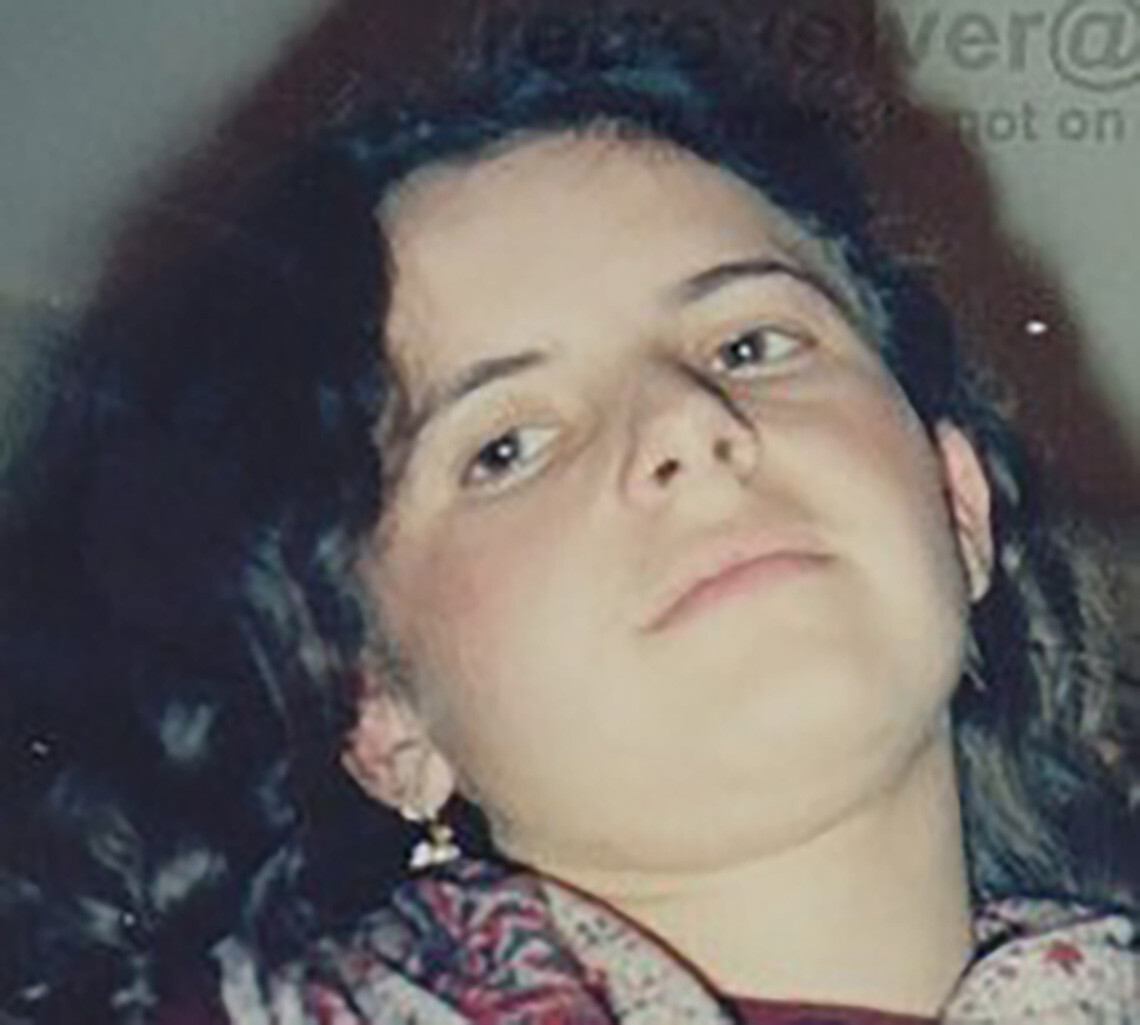 Beautiful Young Woman with a Lovely Face in the Spotlight Unusual Snapshot Photo