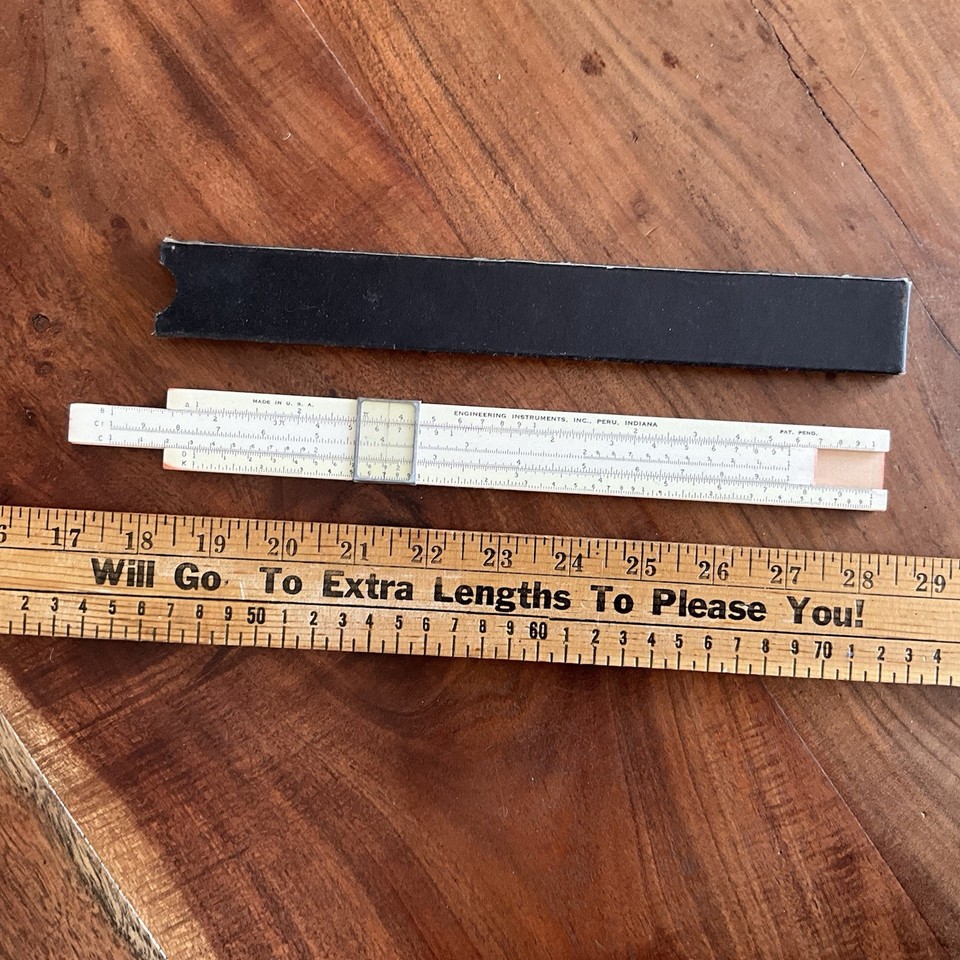 A Made-in-USA vintage slide rule from a real Indiana instrument company — charming Americana engineering history complete with its original case.