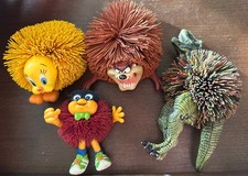 Koosh Balls Lot of 4 Various Sizes Taz, Tweety, Jurassic Park and Kooshling Vtg