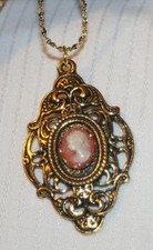 Delightful Festooned Peach Cream Cameo Lady Inset Goldtone Pendant Necklace