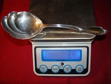 INTERNATIONAL STERLING RHAPSODY 9" CASSEROLE SPOON NO MONOGRAM