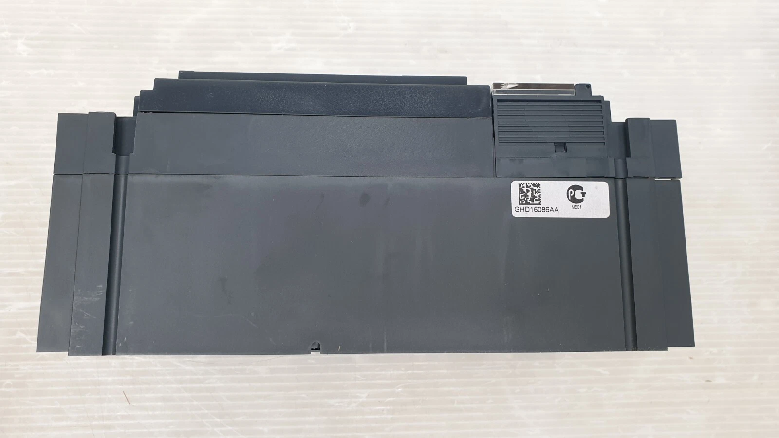 Other side of the NSX630N breaker case with a small data matrix label