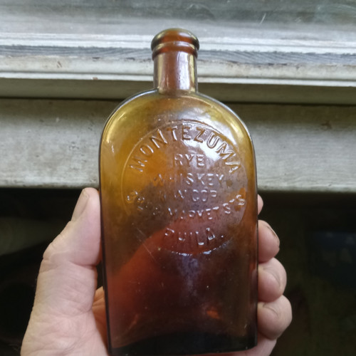 MONTEZUMA RYE WHISKEY PHILA SCARCE 1880s AMBER 1/2 PINT STRAP SIDE FLASK