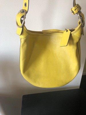 yellow leather duffle bag