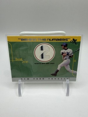 2003 Fleer E-X Derek Jeter #BTNGU-DJ Behind the Numbers Game-Used Jersey /500