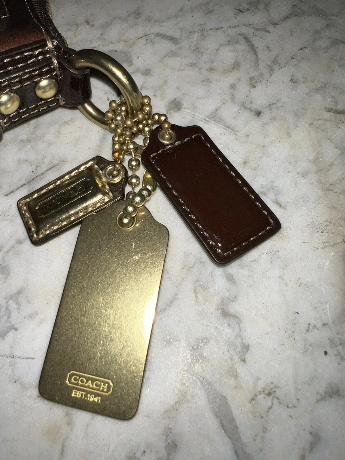 Pochette vintage Coach marrone monogramma pochette da polso lunga 12"