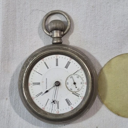 antique Waltham 1883 pocket watch with a sub-second dial in a silverode case