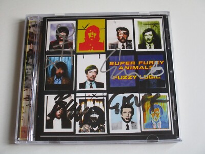 SUPER PELZIGE TIERE - SELTENE HANDSIGNIERTE CD - FUZZY LOGIC - BAND HANDSIGNIERT