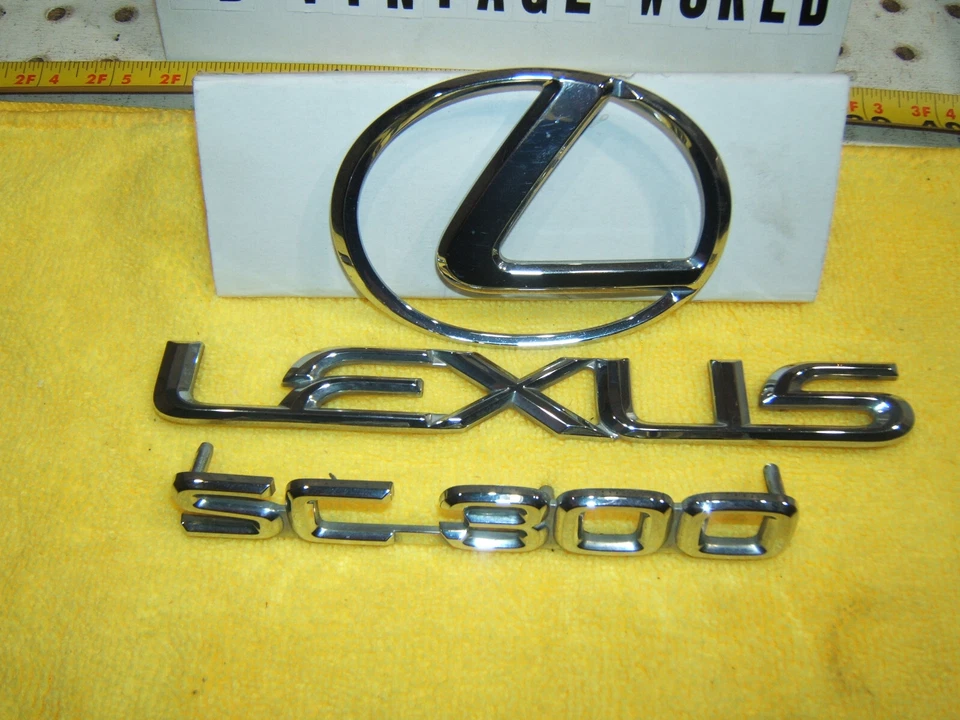 Original Lexus 92-96 SC300 cromado maletero trasero plástico Lexus OEM 3 emblemas Foto 2 de 4