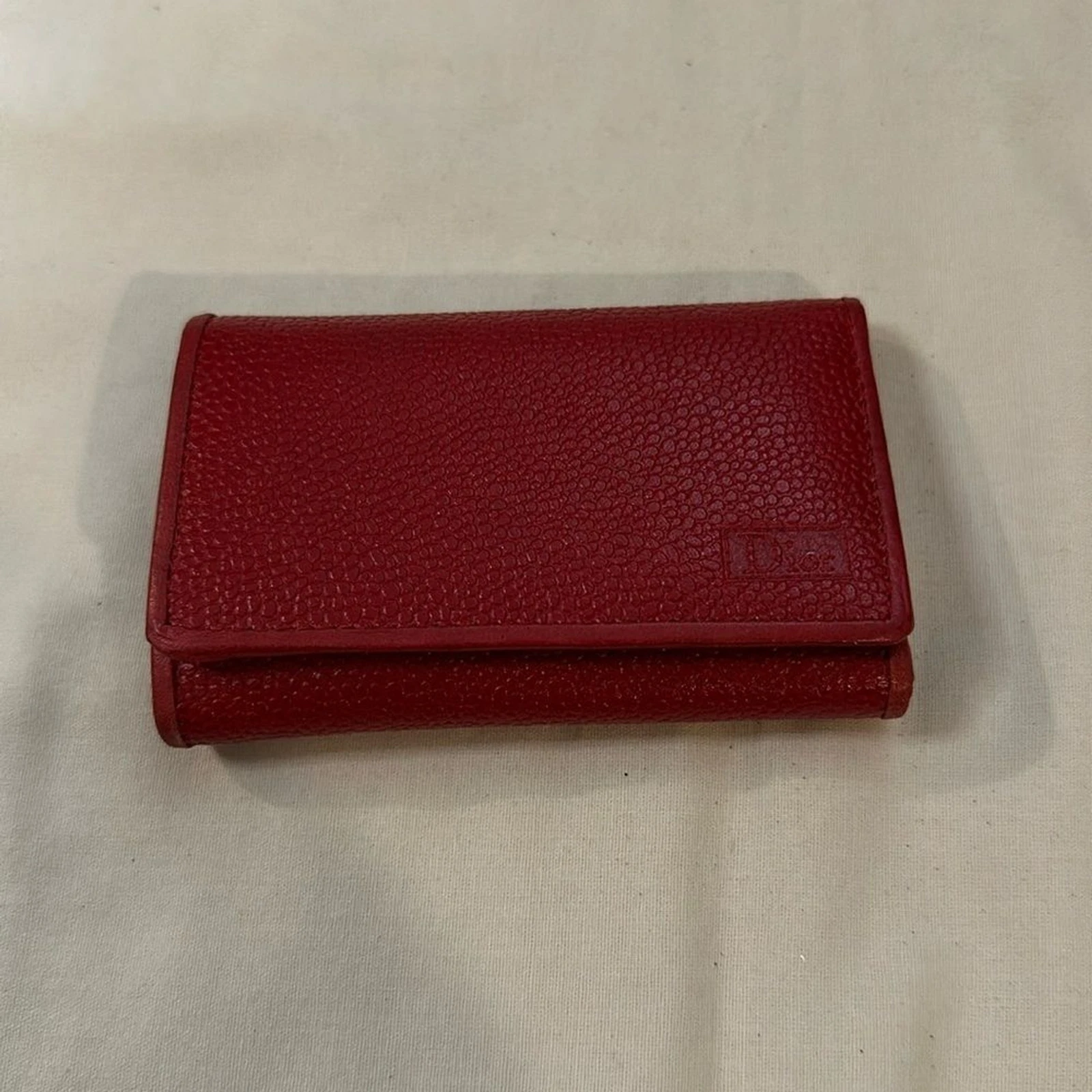 Porte clés / mini portefeuille Dior