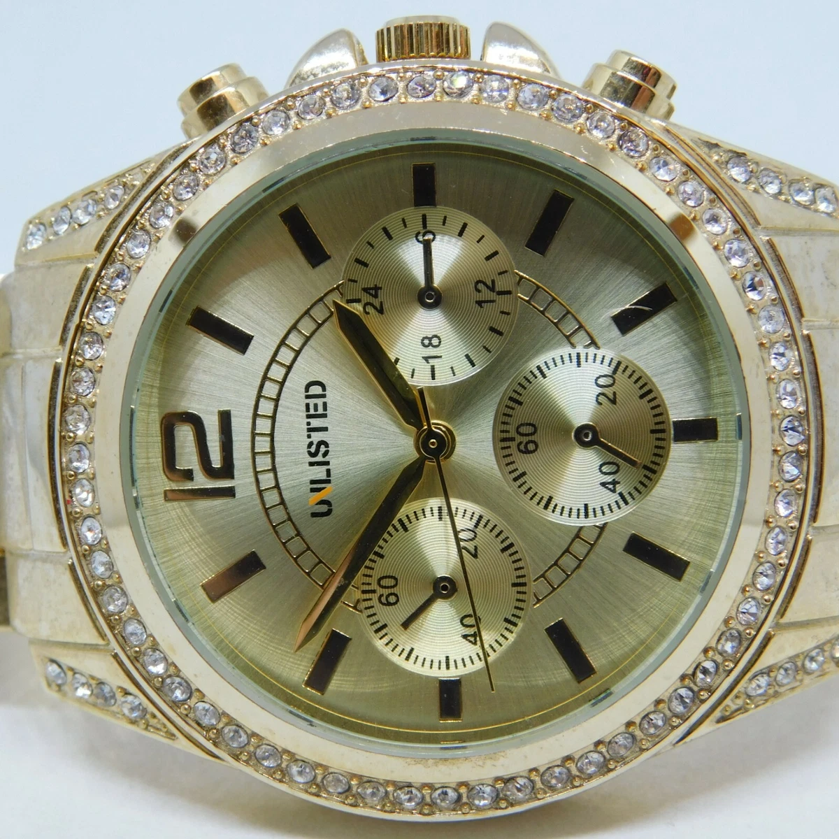Unlisted gold best sale watch