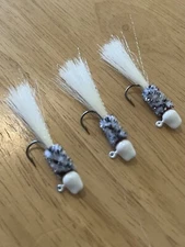 Three hand tied 1/16 crappie jigs