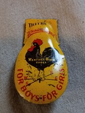 Vintage Weatherbird Shoes Advertising Tin Litho Clicker Toy.