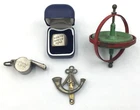 WW2 Military Collectibles - Ditch Whistle, Ring, Cap Badge and Gyroscope