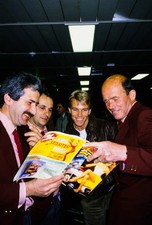 Stefan Johansson reads a magazine Portuguese GP at Circuito Estori- Old Photo