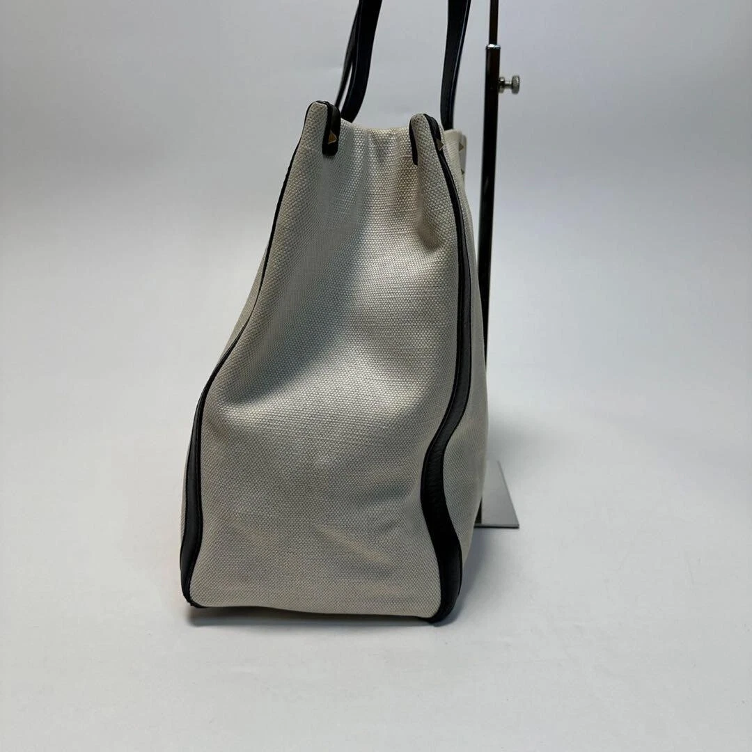 Borsa Valentino tela VLTN pelle borchiata