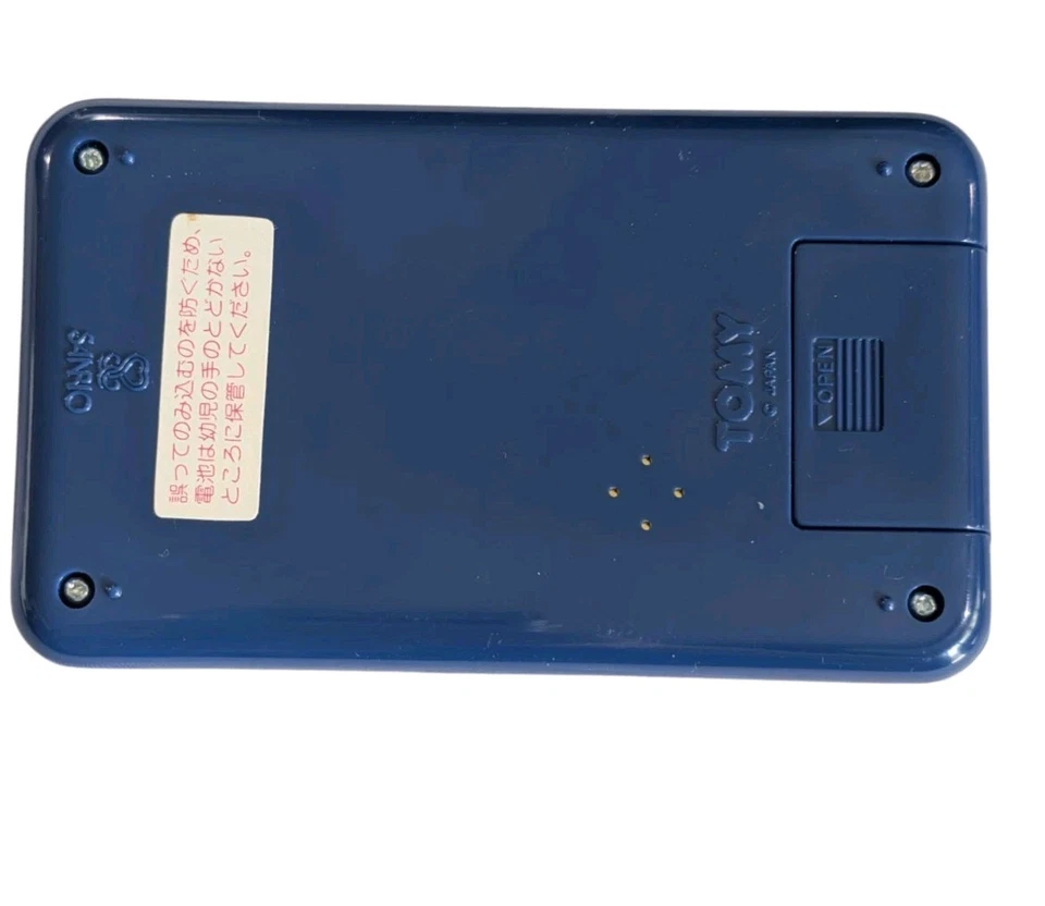 Juego digital Hello Kitty Tomy Seaside Holiday 1976 vintage Japón azul portátil Foto 3 de 4