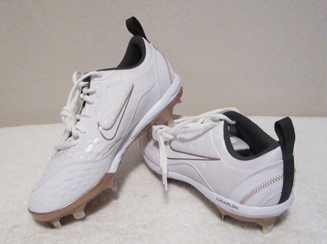 gold and white softball cleats