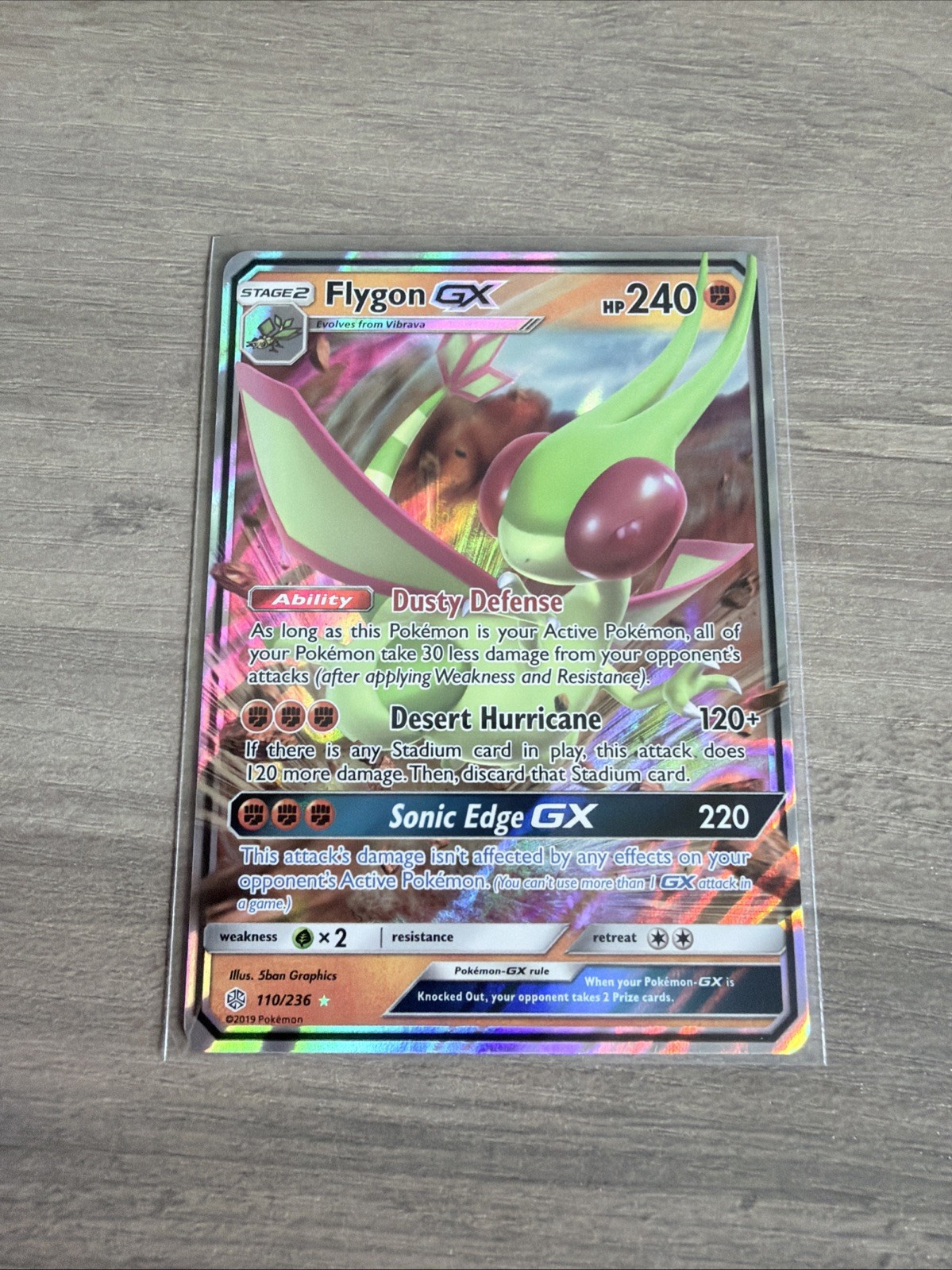 Flygon GX 110/236 Holo Unified Minds Pokemon Card