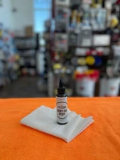 Shiny Car Stuff 2 Ounce Bottle With 2 Free Application Towels SCS2