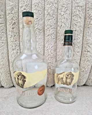 Two Empty Buffalo Trace  Bourbon Bottles One, 1.75 L and 750 ML.