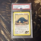 2000 POKEMON GYM HEROES 1ST EDITION #33 ROCKET'S SNORLAX PSA 8