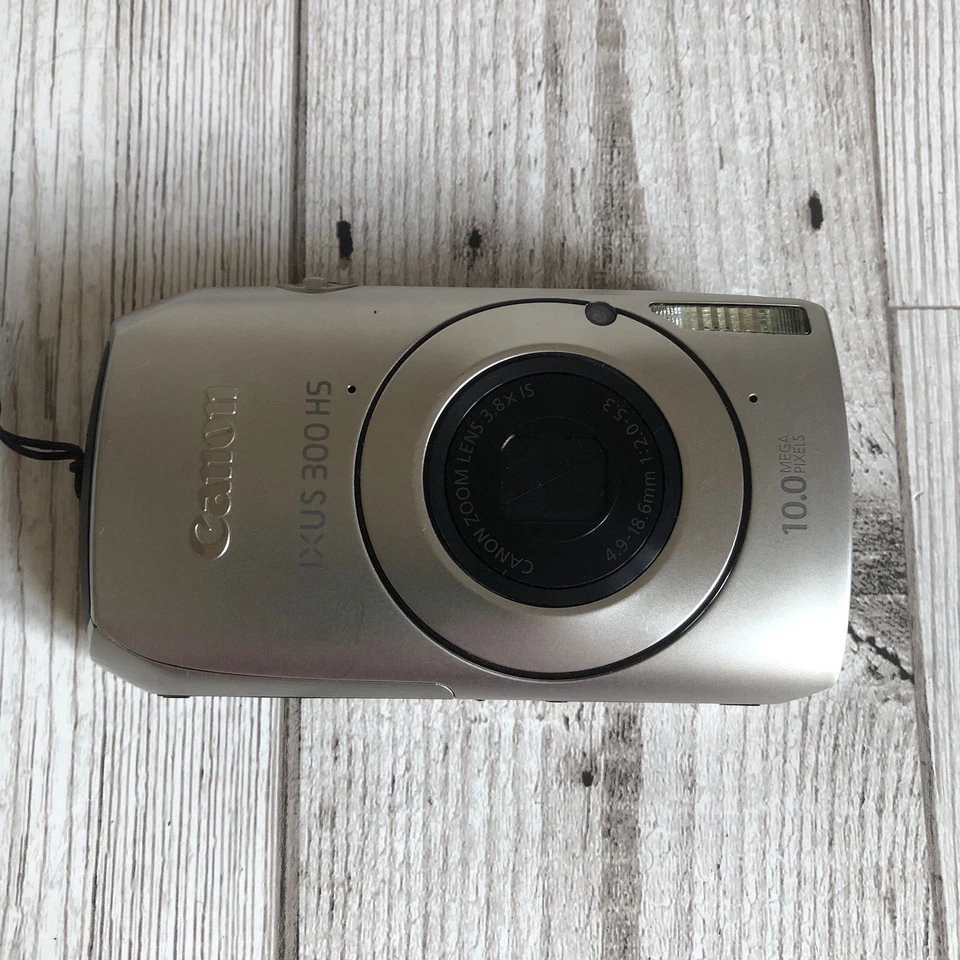 Canon IXUS 300 HS Camera + Battery/Charger, Leaflets, Discs, Cable, Wrist Strap - Image 4 of 4