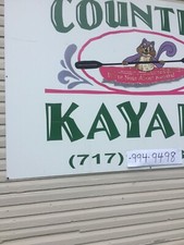 large kayak sign