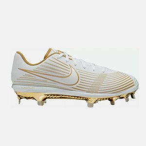 gold and white softball cleats