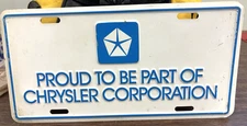 VTG. 1980s PROUD TO BE ... CHRYSLER CORPORATION LICENSE PLATE HUNTSVILLE AL sign