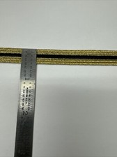 Rice Flat Braid- Metallic Gold 101/Black Center 3/8โ Wide 144 Yards- Made In USA