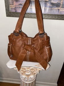 brown leather hobo bolsa