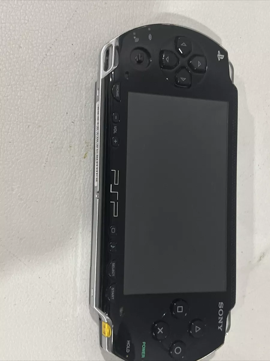 Sony PSP Go PSP 1001 PlayStation Portable Black With 15 Spare Games Disks