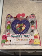 SQUISHMALLOWS SQUISH-A-LONGS - VALENTINE'S DAY-8 PIECE SET-SERIES 2 PURPLE- CASE
