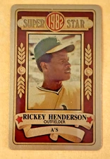 1982 PERMA GRAPHIC==GOLD==SUPER-STAR #-223 RICKEY HENDERSON==OAKLAND ATHLETICS