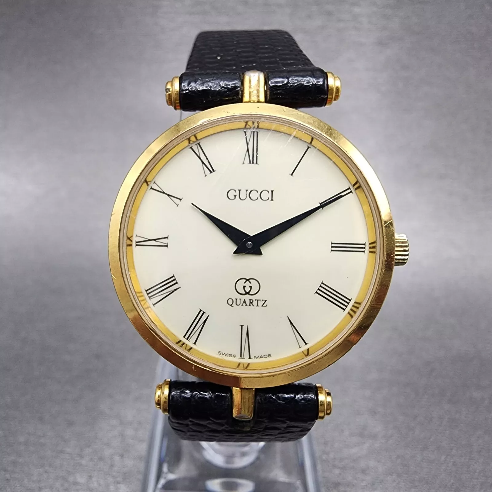 Montre Gucci 2000M homme 30 mm cadran crème ton or ligne sherry ronde pile neuve