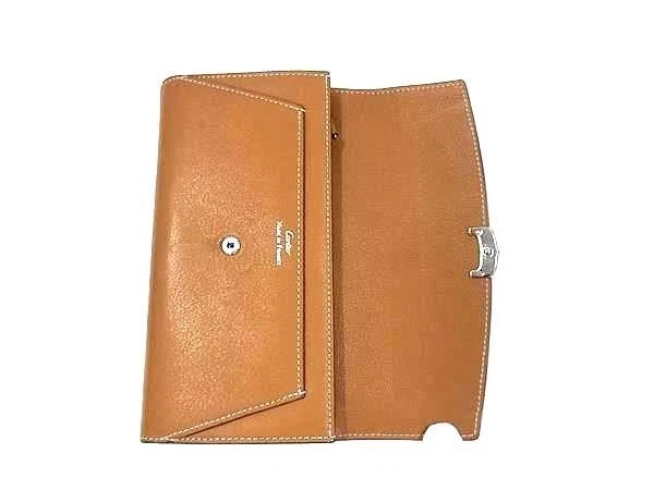 Cartera larga Cartier C de Cartier para mujer de cuero marrón plegable Foto 3 de 4