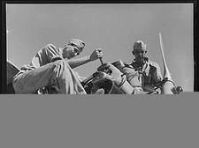 Corpus Christi, Texas. Mechanics repairing the engine of a plane at the Civil