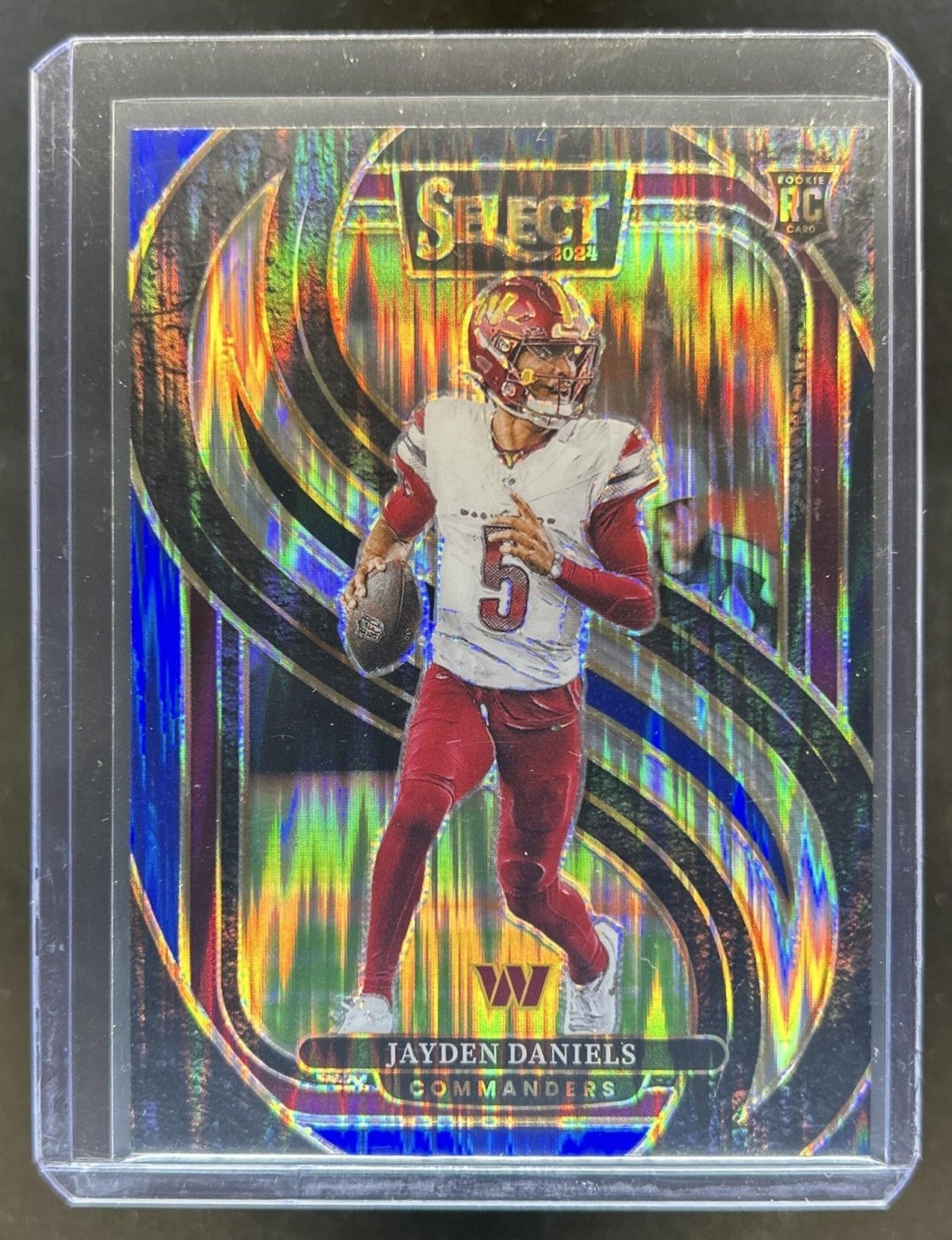 2024 Panini Select Jayden Daniels Premier RC Black and Blue Prizm Shock #112