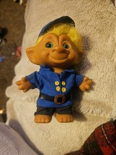 Troll capelli gialli poliziotto novità asso