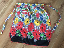 Apron. Retro 1970s half apron with pocket. vivid floral style. Pre owned.