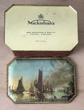 A VINTAGE MACKINTOSH'S 9.25" LONG, 311g, YARMOUTH WATER FROLIC-THEMED SWEET TIN