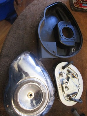 2012 Harley Davidson FLD 103 comma air cleaner filter housing backplate assembly
