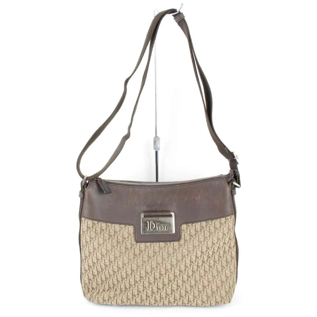 Sac bandoulière trotteur Christian Dior toile/cuir marron occasion
