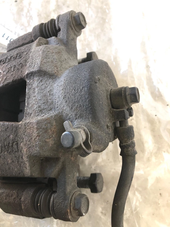 Chevrolet Aveo 2004-2011 sedán 1,6 L pinza de freno delantera izquierda lado del conductor izquierda izquierda Foto 4 de 4