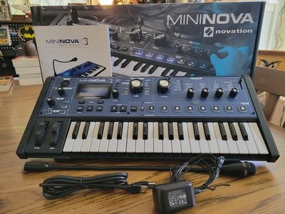 Novation MiniNova synthesizer  complete with box, plus stands