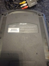 Atari Jaguar Console With DOOM Game.