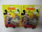 Matchbox Lesney Disney Mickey's Fire Engine- with & without hook, blistercards